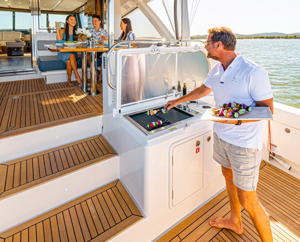Riviera 46 Sports Motor Yacht Australia cooking on Epicure Pro Electric BBQ